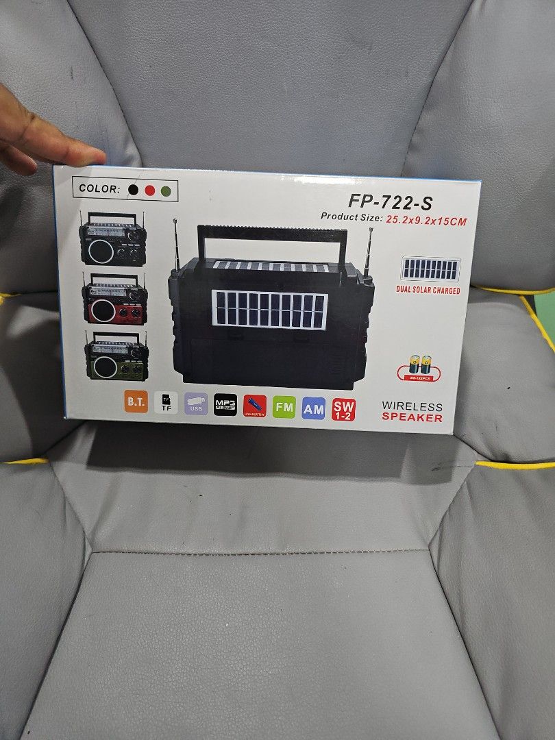 FP-722-S Wireless Speaker with Bluetooth, USB, and FM (Category: Portable Audio Accessories) located in Singapore. Submitted by rockbro_07 (Listing ID 1372428139, Image 3). Description: Hey there! Check out this brand new FP-722-S wireless speaker. It's got a cool retro design and comes with a bunch of features like Bluetooth, USB, and FM radio. The box shows it has AM and SW 1-2 as well. It's a great size, measuring 25.2 x 9.2 x 15cm. It comes i