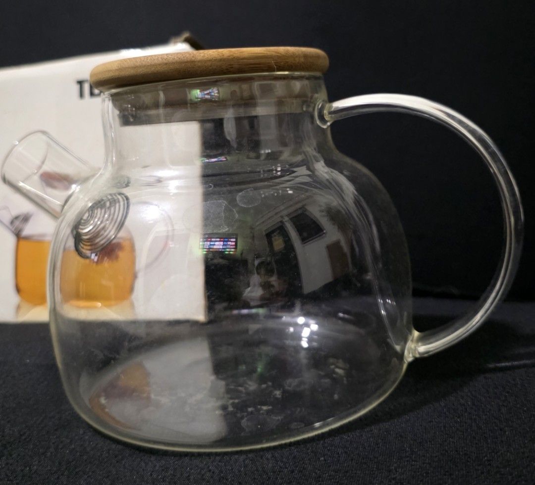 Glass Tea Pot with strainer (Category: Coffee & Tea Tableware) located in Manila. Submitted by a.solo (Listing ID 1372389237, Image 2). Description: LET'S MAKE READING A HABIT ▪️Used twice ▪️With strainer RFS: Decluttering Note: 1.Please allow 1cm differs due to manual measurement. 2.Due to the different display and different light, the picture may not reflect the actual color of the item. 3. For full details and other photos, just PM me. Please 