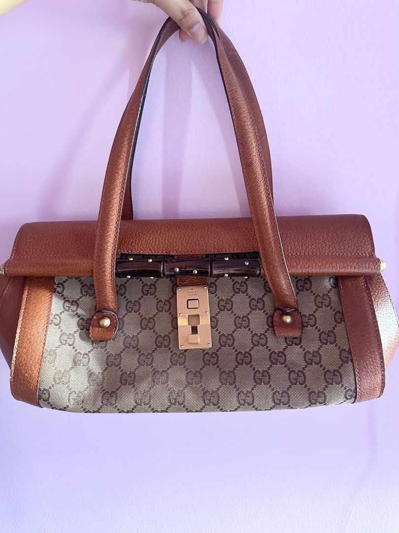 Gucci bamboo top handle (Category: Bags & Wallets) located in Singapore. Submitted by blondetta (Listing ID 1372341175, Image 1). Description: Good condition. No stains. Gold hardware and interior is clean. Selling in as-it-is condition. Slight negotiation acceptable. I have the Authenticity card from authenticator provider. 💯 .