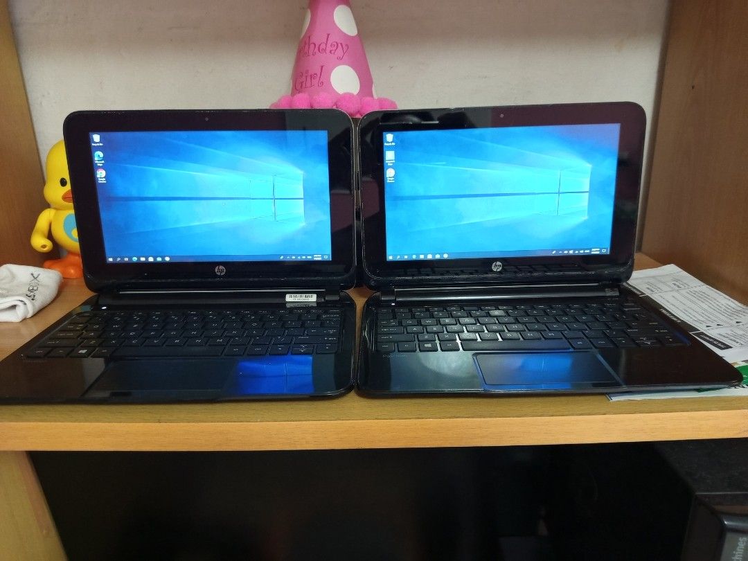$80 for two HP touchscreen laptops (Category: Laptops & Notebooks) located in Singapore. Submitted by cttan456 (Listing ID 1372342174, Image 1). Description: $80 for 2 units of HP Pavilion 10 TouchSmart. Laptop 1 is working perfectly. Laptop 2 selling as spoilt because sometimes cannot power on and keyboard and left speaker spoilt but can use touchscreen keyboard and still usable. Original chargers and batteries working. 10 inch touch screen. 320
