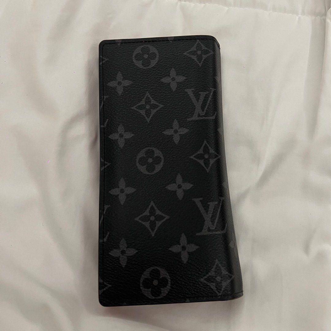 Louis Vuitton Monogram Eclipse Space Age Brazza Wallet *Free Shipping (Category: Luxury Bags & Wallets) located in General Santos City (Dadiangas). Submitted by prelovedbyshash (Listing ID 1372289409, Image 3). Description: Authentic 💯 Size Base length: 2.75 in Height: 7.5 in Width: 1 in Bought this around ₱ 58,000 Condition 9/10, no issue Comes with box & dust bag, no receipt.