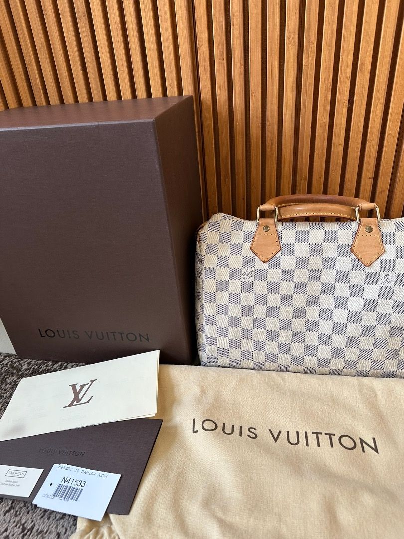 LOUIS VUITTON Speedy 30 Damier Azur (Category: Luxury Bags & Wallets) located in Quezon City. Submitted by istaytside (Listing ID 1372343531, Image 2). Description: LOUIS VUITTON Speedy 30 Damier Azur Crafted from graphic Damier Ebene canvas, the Speedy 30 is an elegant, compact handbag, a stylish companion for city life. Launched in 1930 as the "Express" and inspired by that era's rapid transit, today’s updated Speedy remains a timeless House ic