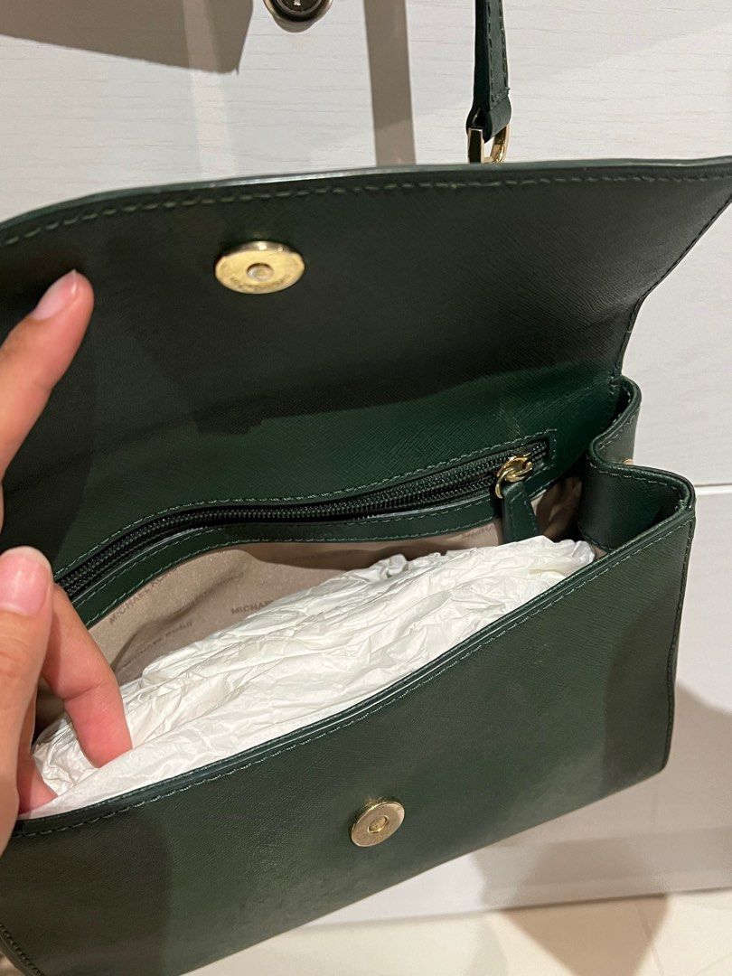Michael Kors Leather Shoulder Bag in Green (Category: Luxury Bags & Wallets) located in Paranaque City. Submitted by lois.ng (Listing ID 1372401462, Image 3). Description: Authentic Michael Kors Green Leather Shoulder Bag / Hand Bag No flaws! 10/10 condition Comes with original dust bag Rfs: Rush decluttering, not being used PM for more details!.