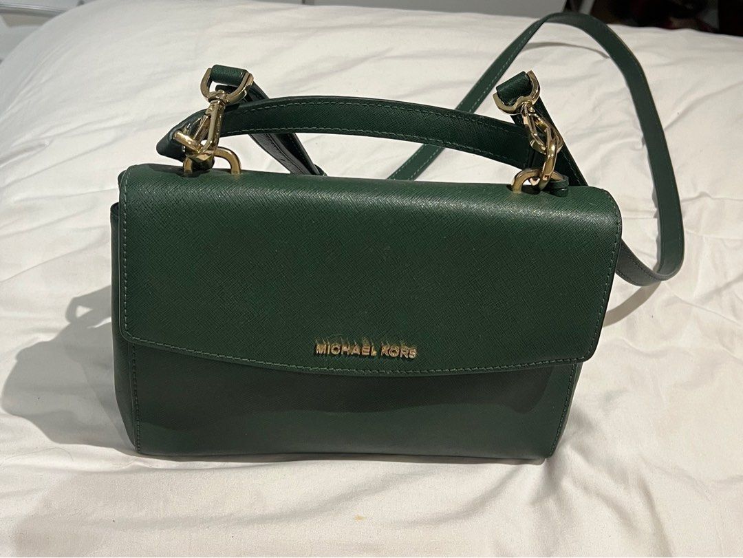 Michael Kors Leather Shoulder Bag in Green (Category: Luxury Bags & Wallets) located in Paranaque City. Submitted by lois.ng (Listing ID 1372401462, Image 1). Description: Authentic Michael Kors Green Leather Shoulder Bag / Hand Bag No flaws! 10/10 condition Comes with original dust bag Rfs: Rush decluttering, not being used PM for more details!.