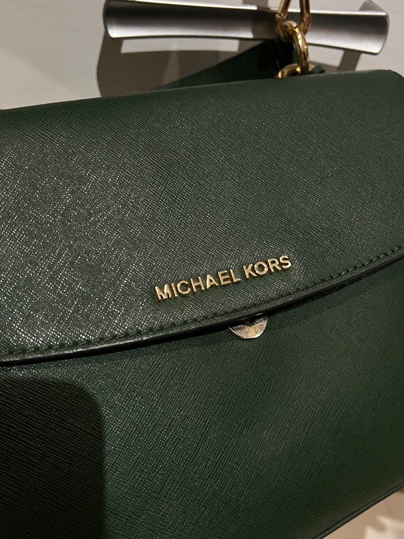 Michael Kors Leather Shoulder Bag in Green (Category: Luxury Bags & Wallets) located in Paranaque City. Submitted by lois.ng (Listing ID 1372401462, Image 2). Description: Authentic Michael Kors Green Leather Shoulder Bag / Hand Bag No flaws! 10/10 condition Comes with original dust bag Rfs: Rush decluttering, not being used PM for more details!.
