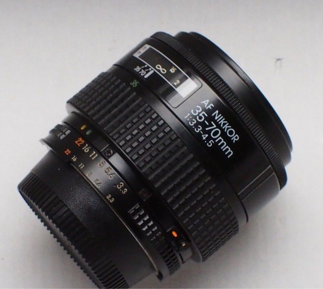 Nikon Nikkor lens 35-70f3.3 (Category: Lens & Kits) located in Las Pinas. Submitted by film101 (Listing ID 1372407886, Image 1). Description: Nikon AF nikkor 35-70 f3.3-4.5 Made in JAPAN Best on this lens Can do manually arrange the aperture and manual focusing CLEAN OPTICS nO haze Aperture snaps Focusing smooth Take note ;kindly take a reserch bout this LENS for AF functions in your camera .