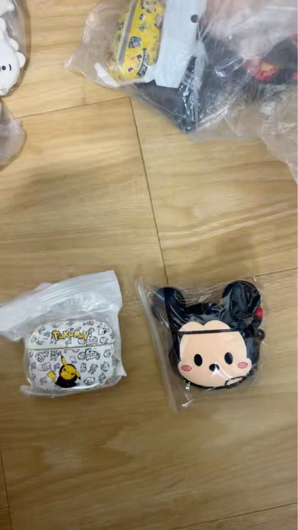 Pokemon Pikachu AirPods Case (Category: Earphones) located in Singapore. Submitted by specificism (Listing ID 1372344034, Image 1). Description: Hey there! Check out this super cute Pokemon Pikachu AirPods case! It's brand new and still in its original packaging. The case features a fun design with Pikachu and other Pokemon characters. It's perfect for protecting your AirPods while showing off your love for Pokemon. This case is a must-have for a