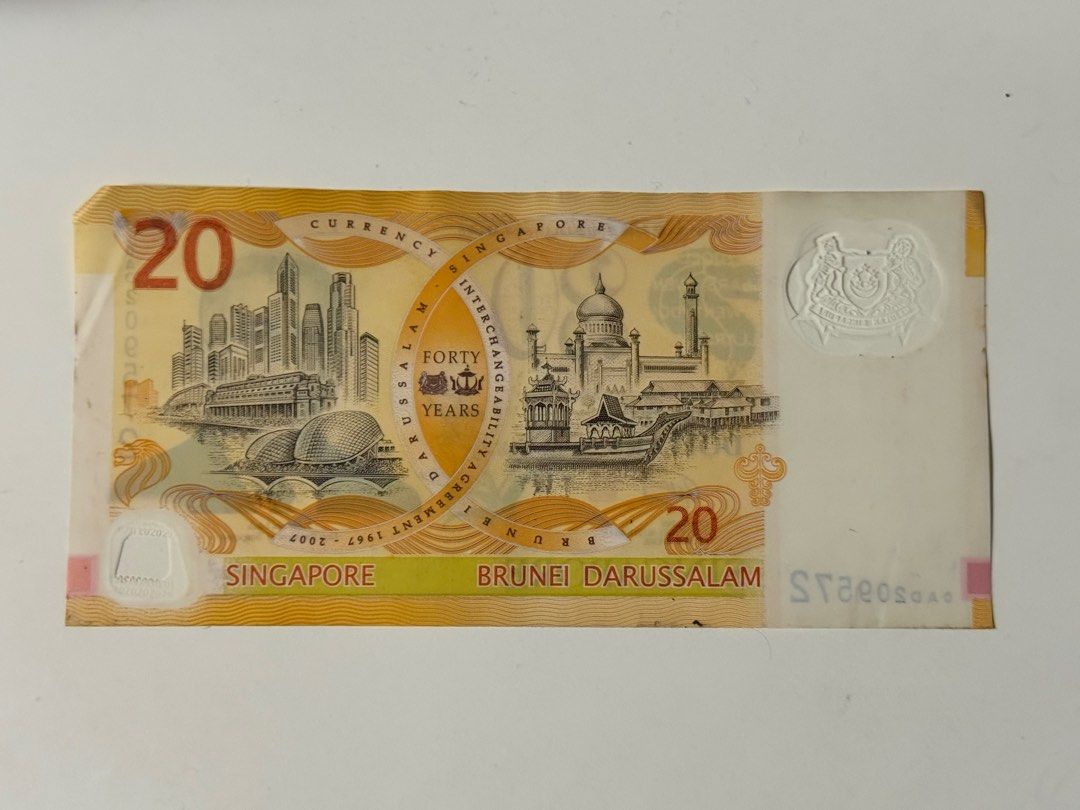 Singapore Brunei Commemorative Dollar $20 (Category: Currency) located in Marikina City. Submitted by 0t3y.archive (Listing ID 1372431733, Image 2). Description: Singapore $20 commemorative note, issued in 2007 to mark the 40th anniversary of the Currency Interchangeability Agreement between Singapore and Brunei. Note: For Metro Manila buyers only.