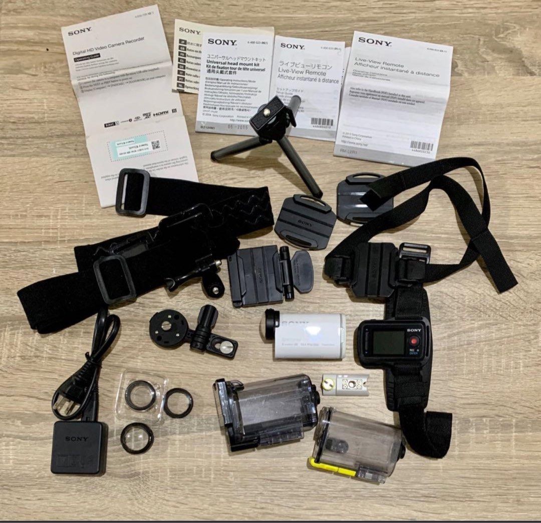 Sony HDR-AS100V Action Camera Bundle (Category: Video Cameras) located in Davao. Submitted by mumsue (Listing ID 1372397266, Image 1). Description: Bundle includes: 👀Sony HDR-AS100V Action Camera 👀Live View Remote 👀Charger 👀Underwater flat lens casing 👀Waterproof casing (w/o lens protector) 👀Replacement lens cap 👀Head mount 👀Helmet clamp mount 👀Dash cam mount 👀Mini tripod 👀Operating Guides with software code (see last pic).