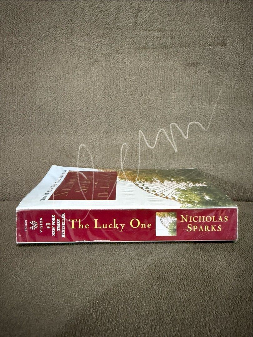 The Lucky One by Nicholas Sparks (Category: Storybooks) located in Rizal. Submitted by ukaysstst (Listing ID 1372409089, Image 3). Description: ‣ The Lucky One (Nicholas Sparks) – ₱100 🐾 A soldier finds a photo of a woman during war—and it leads him on a journey of destiny and love. Classic Sparks, with emotional depth..