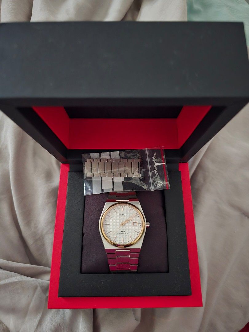 Tissot PRX Powermatic 80 white (Category: Watches) located in Singapore. Submitted by d4mh4 (Listing ID 1372311438, Image 1). Description: Full set. registered on tissot website. has scratches (if you know tissot you know why) selling to declutter collection..