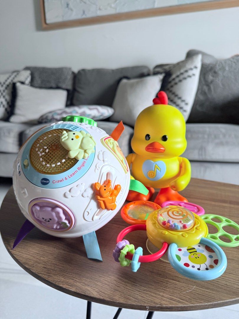 Vtech crawl and learn toy with freebies (Category: Infant Playtime) located in Quezon City. Submitted by thedribbles (Listing ID 1372354877, Image 1). Description: Vtech baby crawl and learn worth 1799 with 2 freebies - dancing duck andwall suction toy. In very good condition with working batteries. RFS: outgrown already.