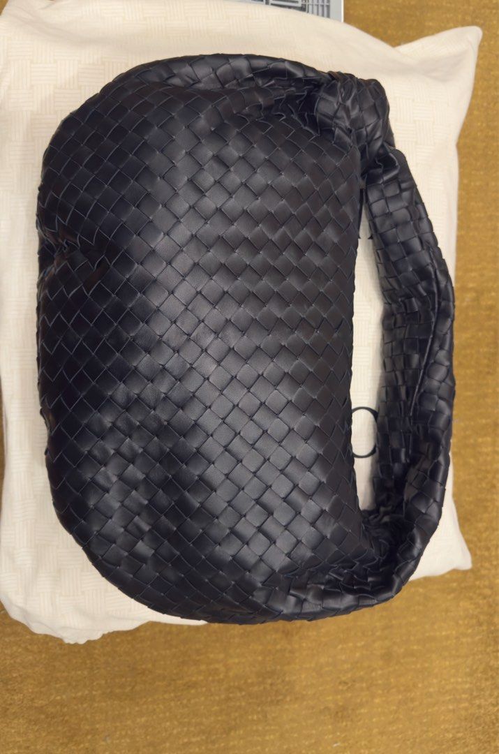 Bottega Veneta Medium Jodie (Black) (Category: Purses & Pouches) located in Pasig City. Submitted by jpecc (Listing ID 1374127762, Image 3). Description: Jodie embodies Bottega Veneta house codes with its knot detail and soft leather Intrecciato. Its supple and rounded hobo shape is designed to fit comfortably to the wearer’s body. Complete inclusion, Bag Dust bag, paper bag certificate of authenticity (gold card with leather case).