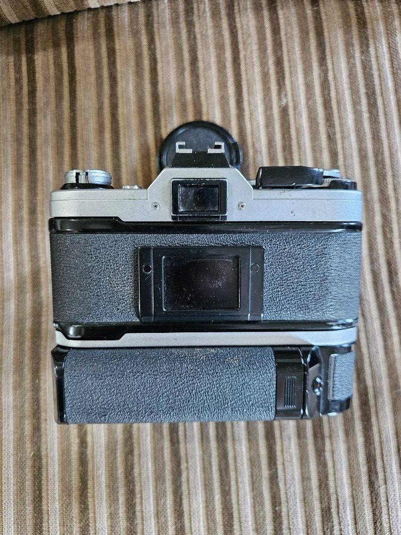 Canon AE-1 with lens& motor drive (Category: Cameras) located in Tagbilaran City. Submitted by lugarpogi (Listing ID 1374004476, Image 3). Description: Canon AE-1 with lens 50mm 1:1.4 FD lens with motor drive.