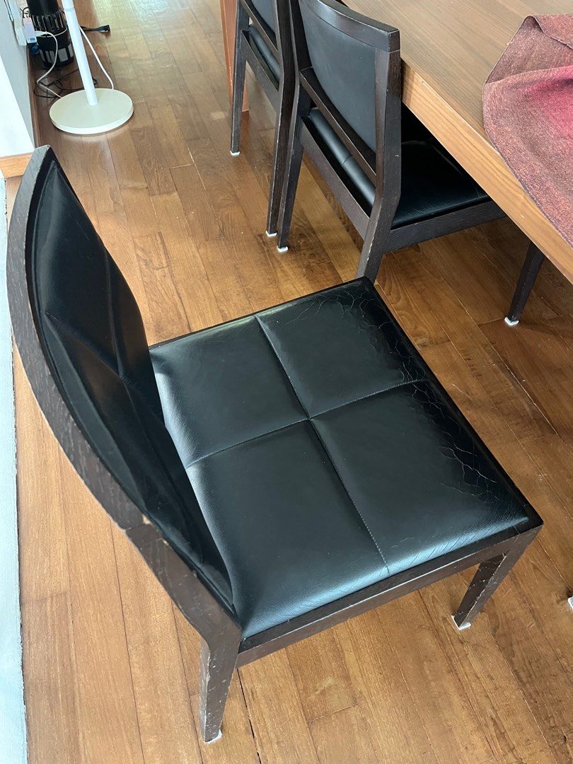 Dining Table Set (Category: Tables & Sets) located in Singapore. Submitted by pretzel8 (Listing ID 1374072637, Image 3). Description: Custom made table with 8 matching chairs that can fit 8 comfortably. 1m x 45cm. Table cannot be dismantled and was made for the house. It is always covered with a tablecloth. Leather on chairs are worn and slightly cracked but not peeling. Chairs and table can be sold separately too..