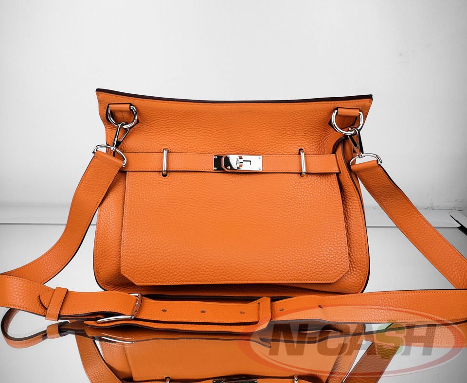 Hermes Jypsiere 34 Orange (Category: Luxury Bags & Wallets) located in Makati City. Submitted by luxury_by_ncash_2 (Listing ID 1373982083, Image 2). Description: N-Cash Pawnshop "Instant Cash for Bags, Watches, Cars, and Electronics" https://www.ncash-pawnshop-philippines.com/ Hermes Jypsiere 34 Orange PRE-OWNED Brand: HERMES Measurements: 13.4″ x 10.2″ x 5.9″ Material: Orange Clemence Leather Unique Lock-Shaped Closure Hardware: Palladium Plated
