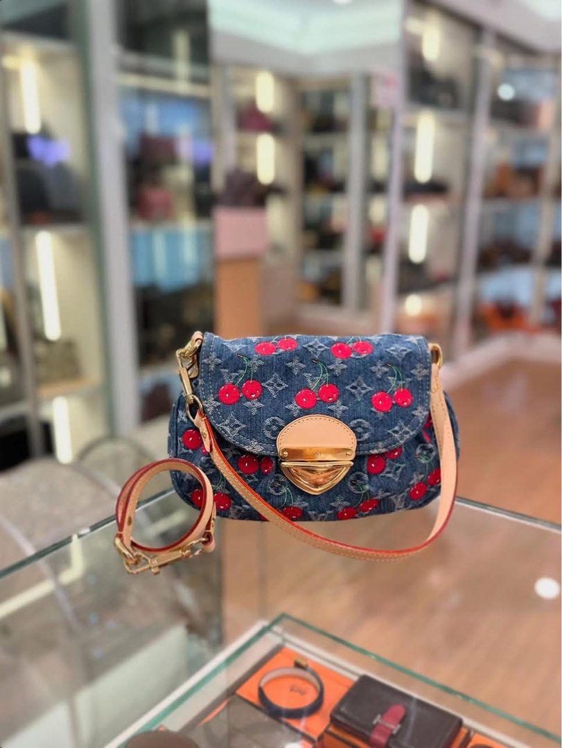 L V x Murakami Cherry Monogram Denim Sunset (Category: Bags & Wallets) located in Singapore. Submitted by bagit.com.sg (Listing ID 1316070937, Image 1). Description: 🍒 RARE 🍒 L V x Murakami Cherry Monogram Denim Sunset. Bag can be worn as a crossbody with the additional detachable leather strap or as a shorter shoulder bag 😍 Full set with receipt. BRAND NEW! ...................................................................... 💲Prices in Sin