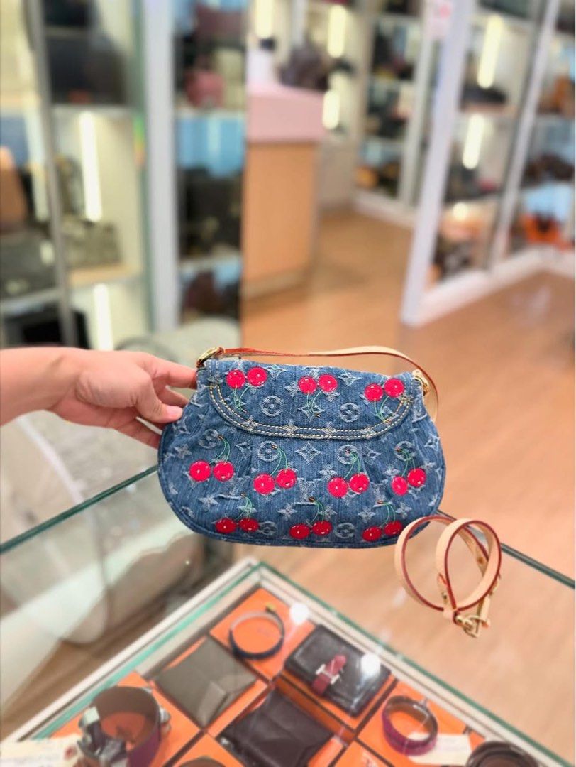 L V x Murakami Cherry Monogram Denim Sunset (Category: Bags & Wallets) located in Singapore. Submitted by bagit.com.sg (Listing ID 1316070937, Image 3). Description: 🍒 RARE 🍒 L V x Murakami Cherry Monogram Denim Sunset. Bag can be worn as a crossbody with the additional detachable leather strap or as a shorter shoulder bag 😍 Full set with receipt. BRAND NEW! ...................................................................... 💲Prices in Sin