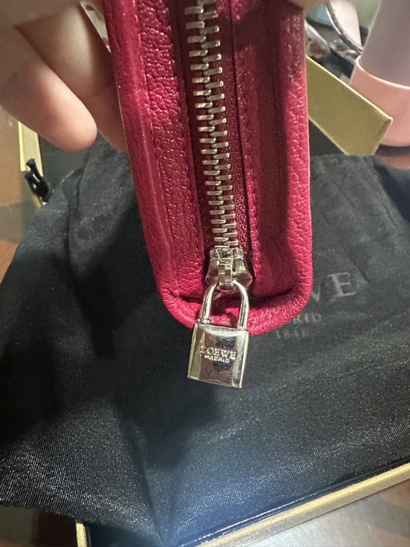 Loewe amazona long wallet red (Category: Luxury Bags & Wallets) located in Manila. Submitted by onestopboutique (Listing ID 1373969440, Image 2). Description: Fabric - leather Color - red Size H-9cm W-19cm D- 2.5cn With box and dustbag.