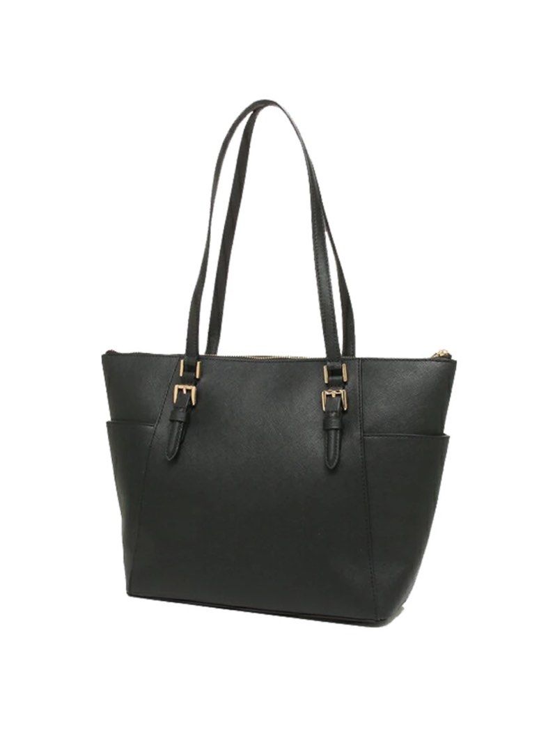Michael Kors Charlotte Black Tote Bag (Category: Luxury Bags & Wallets) located in Bacoor. Submitted by ianisaac99_ (Listing ID 1373969721, Image 2). Description: Michael Kors Charlotte Tote Black Brand New In Box (Gift Box) Asking PHP 10000. Shoot your offers! PM me. The bag itself was never been touched, hindi pa natatanggal sa plastic. I can send you a video of the gift box and package contents, all in original plastic covers pa. Item ships fr