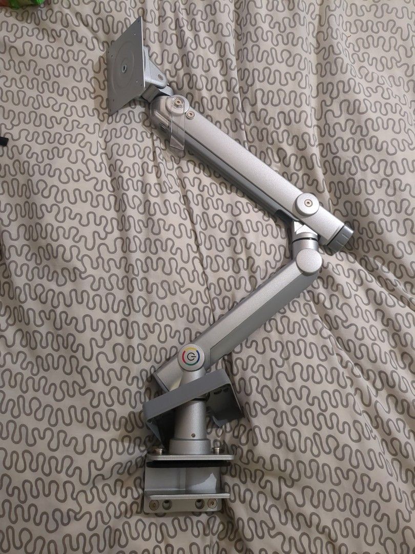 Monitor bracket arm (Category: Monitor Screens) located in Singapore. Submitted by marcogu (Listing ID 1373984492, Image 1). Description: Monitor bracket arm. - Includes vesa mount and easily to bring around, heavy though. - comes with L tools that store inside the structure. - includes plastic parts to keep cables tidy..