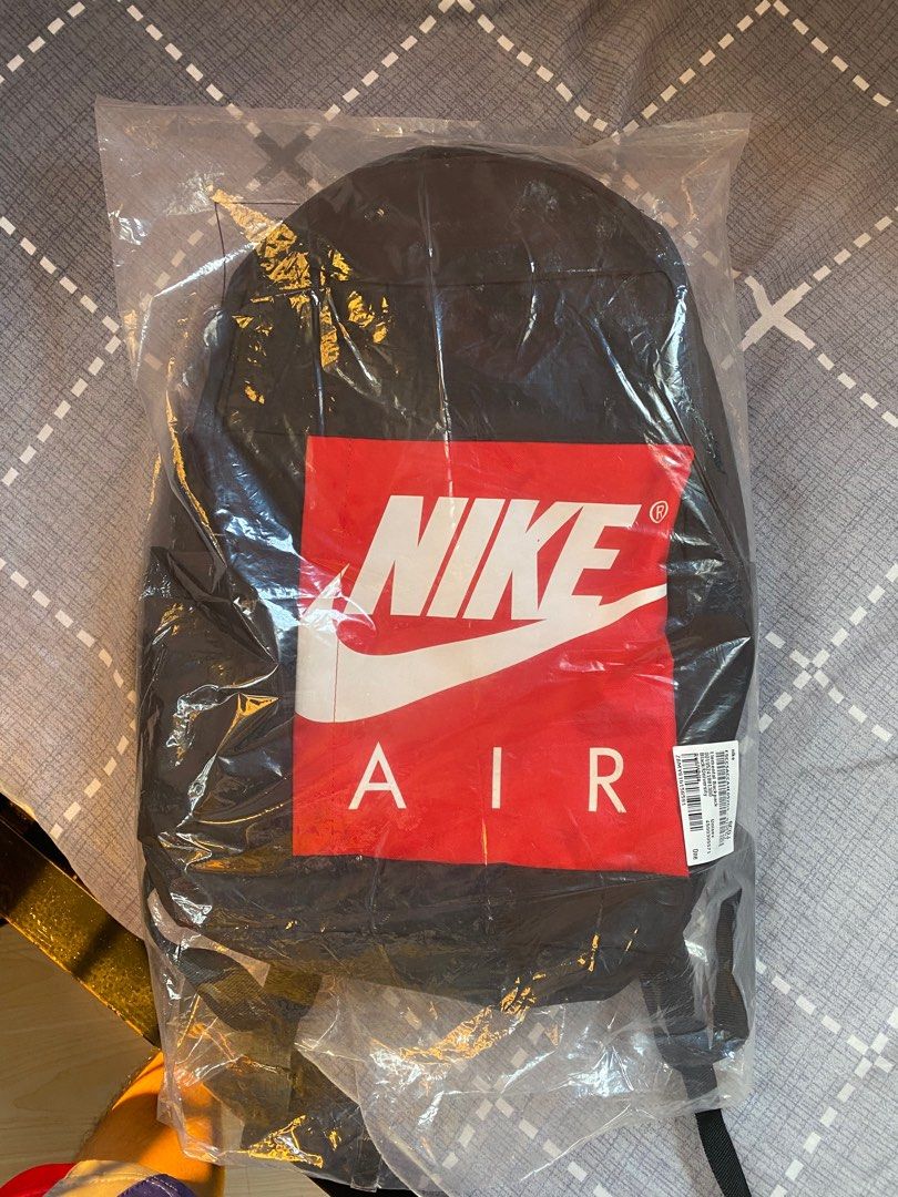 NIKE Elemental Backpack (BLACK/ UNIVERSITY RED/ WHITE) (Category: Backpacks) located in Rosales. Submitted by mga_tinda_ni_dabid (Listing ID 1374011593, Image 1). Description: AUTHENTIC bought from ZALORA complete with original plastic. TAGS are complete (see pics). DIMES/ CAPACITY: 20L (48 × 20 × 12 cm). 4 zipper-access compartments, along with 1 bottle/umbrella holder on each side. Perfect for school. USED but only 3 times. Can pass as brand ne