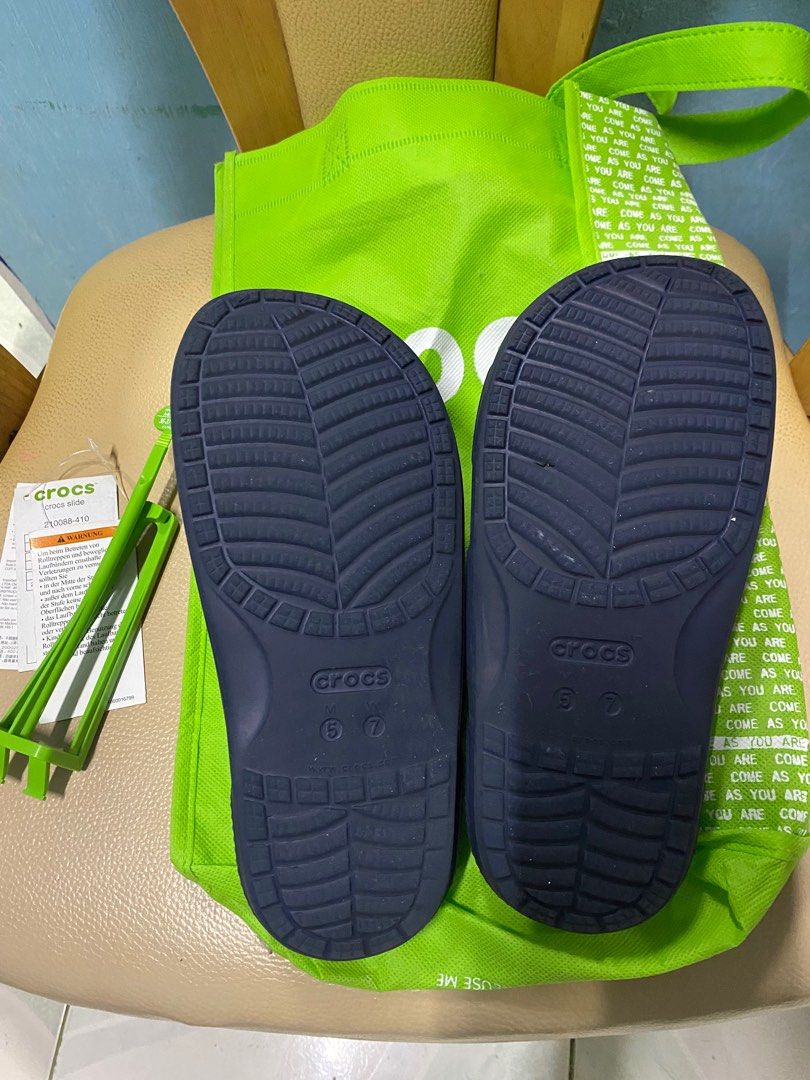 Original crocs two strap slide (Category: Slippers and slides) located in Binan City. Submitted by casseyshoppe (Listing ID 1374091582, Image 2). Description: Nego for sure buyer No inclusion Color navy blue M5 W7 Payment first thru gcash Sf c/o buyer.