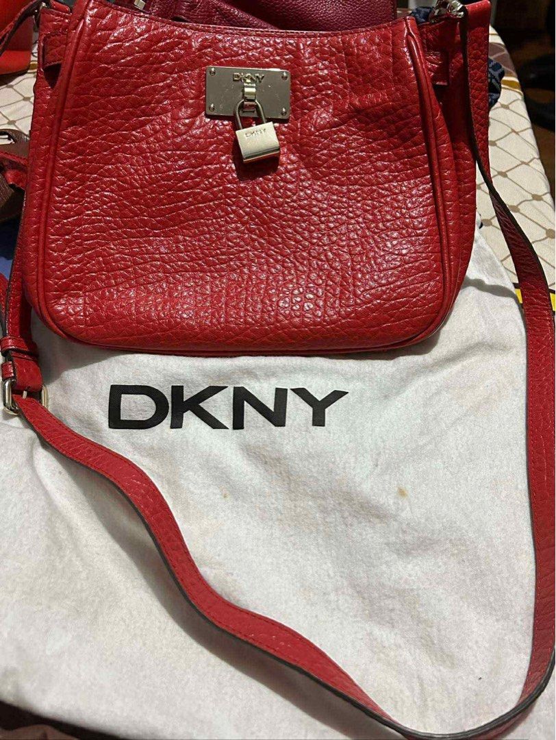 Original DKNY Koko Mini Red Shoulder Bag (Category: Cross-body Bags) located in Quezon City. Submitted by forthriftersph (Listing ID 1374027674, Image 2). Description: Original DKNY Koko Mini Red DKNY Shoulder bag, koko Mini. Width: 19,5 cm. Height: 20,5 cm. Bought in Abudhabi.