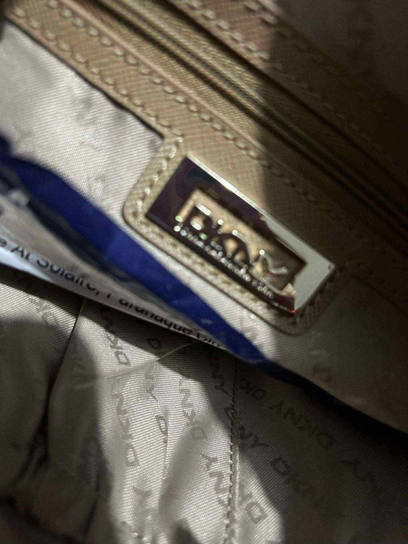 Original DKNY Koko Mini Red Shoulder Bag (Category: Cross-body Bags) located in Quezon City. Submitted by forthriftersph (Listing ID 1374027674, Image 3). Description: Original DKNY Koko Mini Red DKNY Shoulder bag, koko Mini. Width: 19,5 cm. Height: 20,5 cm. Bought in Abudhabi.