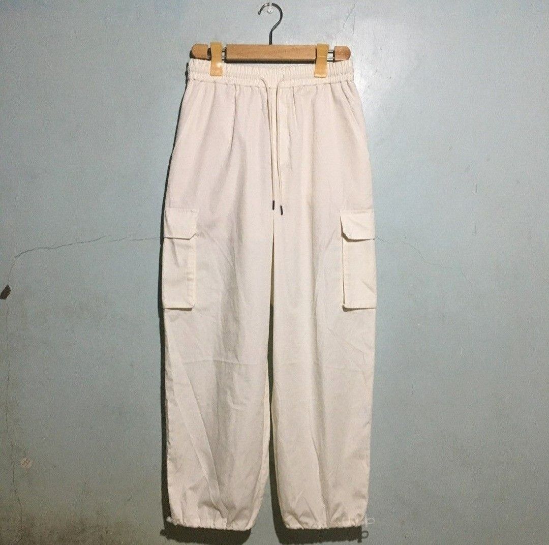 Parachute Pants (GU) (Category: Other Bottoms) located in Pasig City. Submitted by Quelle (Listing ID 1373967965, Image 1). Description: •Bought from another Carouseller but never worn outside •RFS: The style does not suit my body type :( •Medium Size (see tag in pictures), •Off-white/Cream color •Very good quality with no notable flaws •Pictures c/o previous seller.