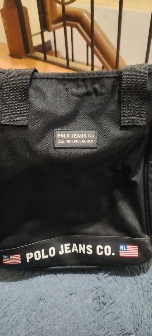 Ralph Lauren Shoulder Bag (Category: Luxury Bags & Wallets) located in Quezon City. Submitted by thesyc (Listing ID 1373967427, Image 2). Description: Authentic Vintage 90’s Polo Sport Ralph Lauren Tote Shoulder Bag. ✅ Well Used with minimal flaw but barely noticeable. ✅Color Black ✅RFS: Declutter, need funds. PM for more details. Thank you and Godbless.