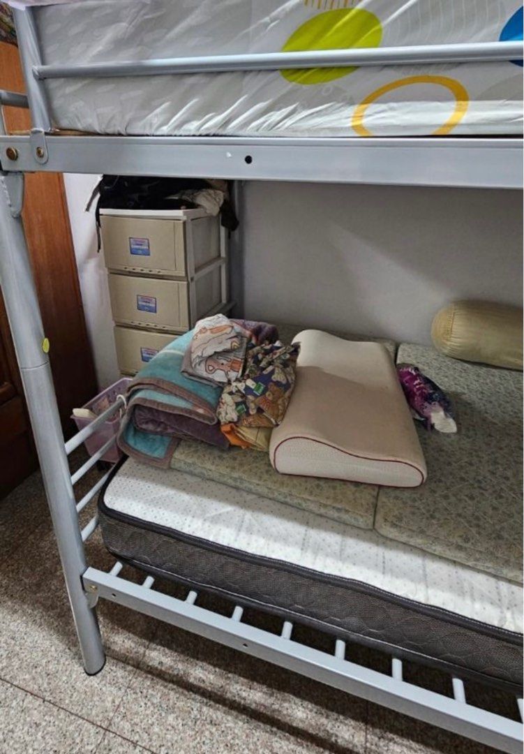 Super Single Metal Bed Frame - Excellent Condition (Category: Garage sale) located in Singapore. Submitted by hann_aircon (Listing ID 1374032228, Image 3). Description: Selling a high-quality super single double decker metal bed frame in excellent condition, used for less than a year. The dimensions are L201cm x W114cm x H168cm (headboard). This frame fits a standard local size mattress and is perfect for any bedroom. Condition: Very good, gently