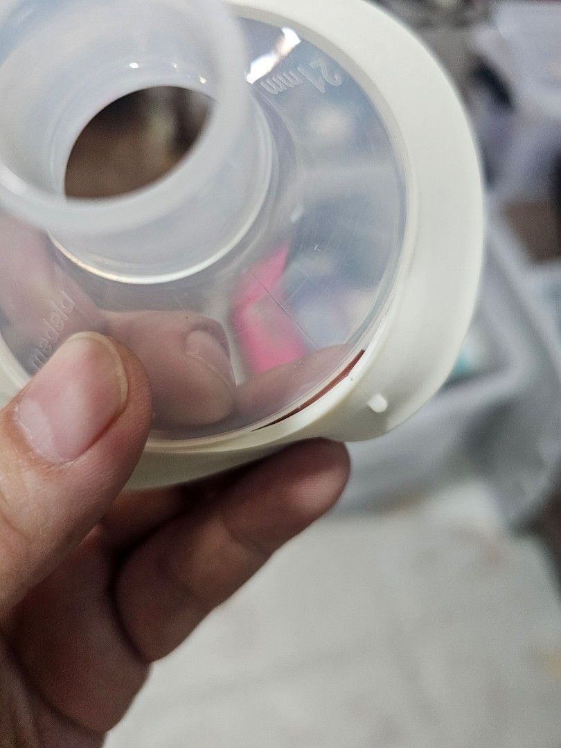Swing Maxi Breast Pump (Category: Breastfeeding & Bottle Feeding) located in Quezon City. Submitted by redjayc (Listing ID 1374054930, Image 3). Description: Swing Maxi breast pump used around 2 years when daughter was still breastfeeding complete box obvious wear from pump attachment (broken latch but still usable, and detached rubber) free bottles and medela collection shells.