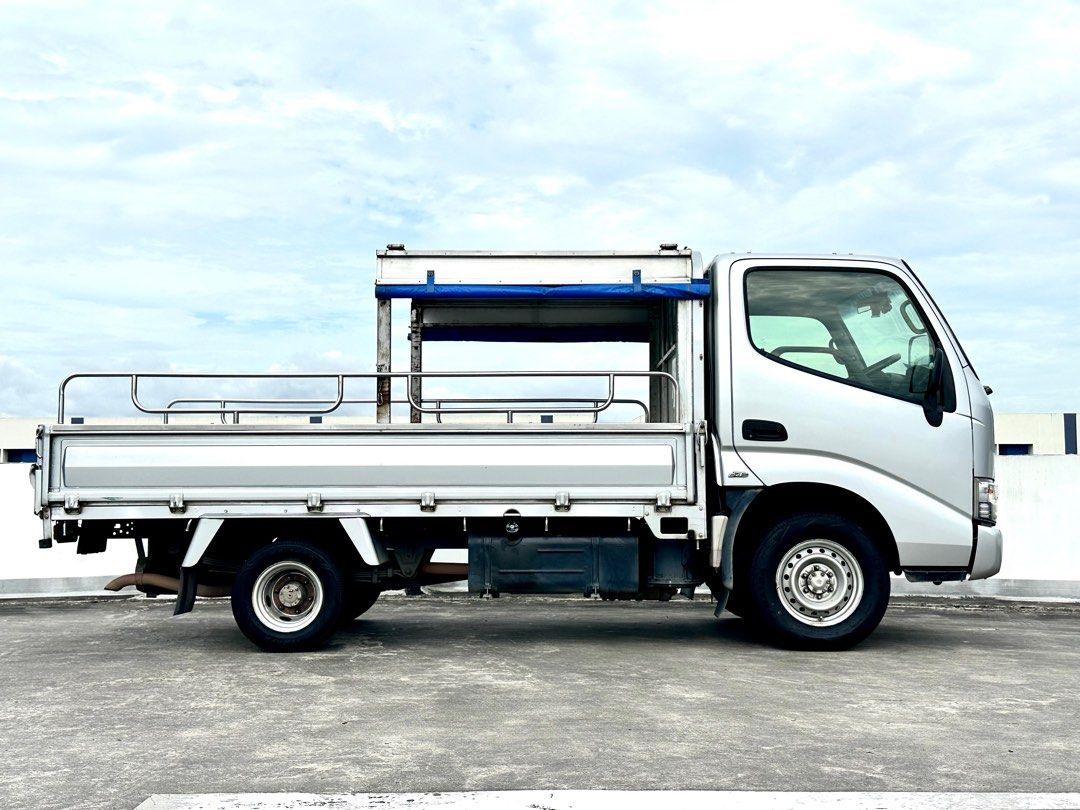 Toyota Dyna 150 (Category: Used Commercial Vehicles for Sale) located in Singapore. Submitted by sgmpteltd (Listing ID 1374002077, Image 2). Description: ☎️8808 3898 - J.T Toyota Dyna 150D Pre-owned 10 feet lorry with half open top canopy and checker plate base, reliable, powerful and healthy engine! Low mileage and well-maintained condition. No Gimmicks! High trade in! Contact now for more details or to schedule a viewing! 📌 Welcome all TRADE I