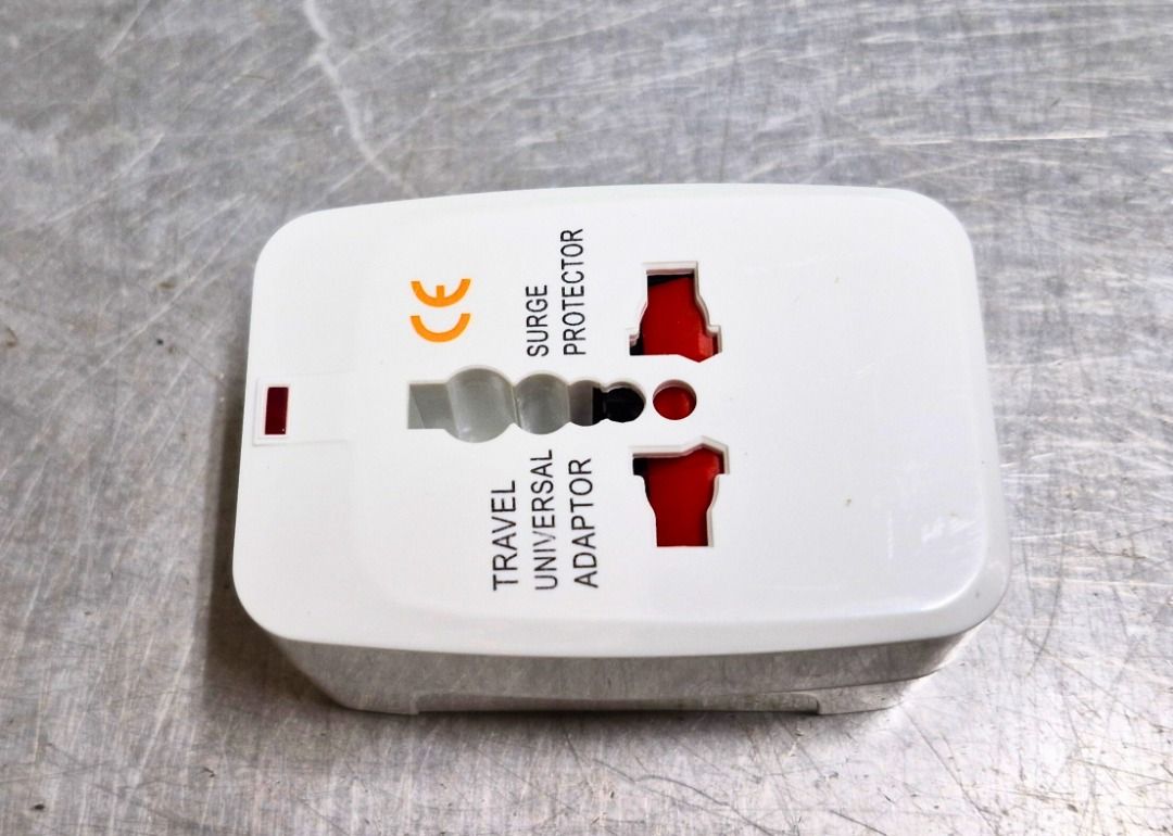 Travel Adaptor (Category: Cables & Adaptors) located in Singapore. Submitted by accufarms86399 (Listing ID 1374050021, Image 1). Description: 8 units as good as new travel adaptor..