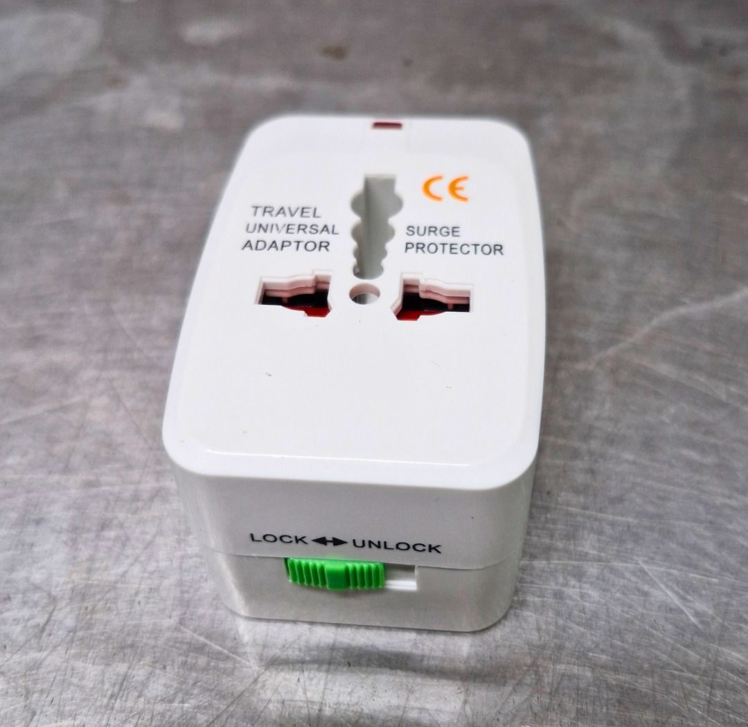 Travel Adaptor (Category: Cables & Adaptors) located in Singapore. Submitted by accufarms86399 (Listing ID 1374050021, Image 2). Description: 8 units as good as new travel adaptor..