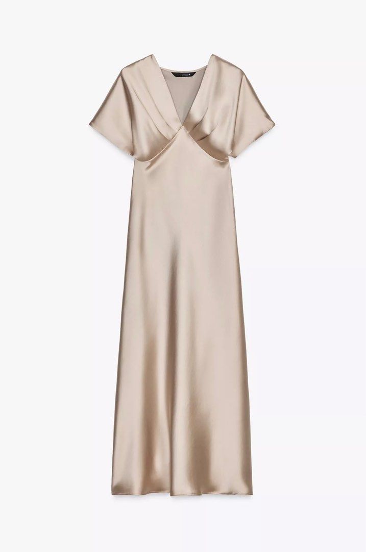 Zara Satin Midi Dress (Category: Dresses) located in Makati City. Submitted by meridaaa (Listing ID 1374097545, Image 1). Description: Original price: ₱2,595 Worn once. Perfect condition. Has a side zipper. Beige color. Message me for when worn..