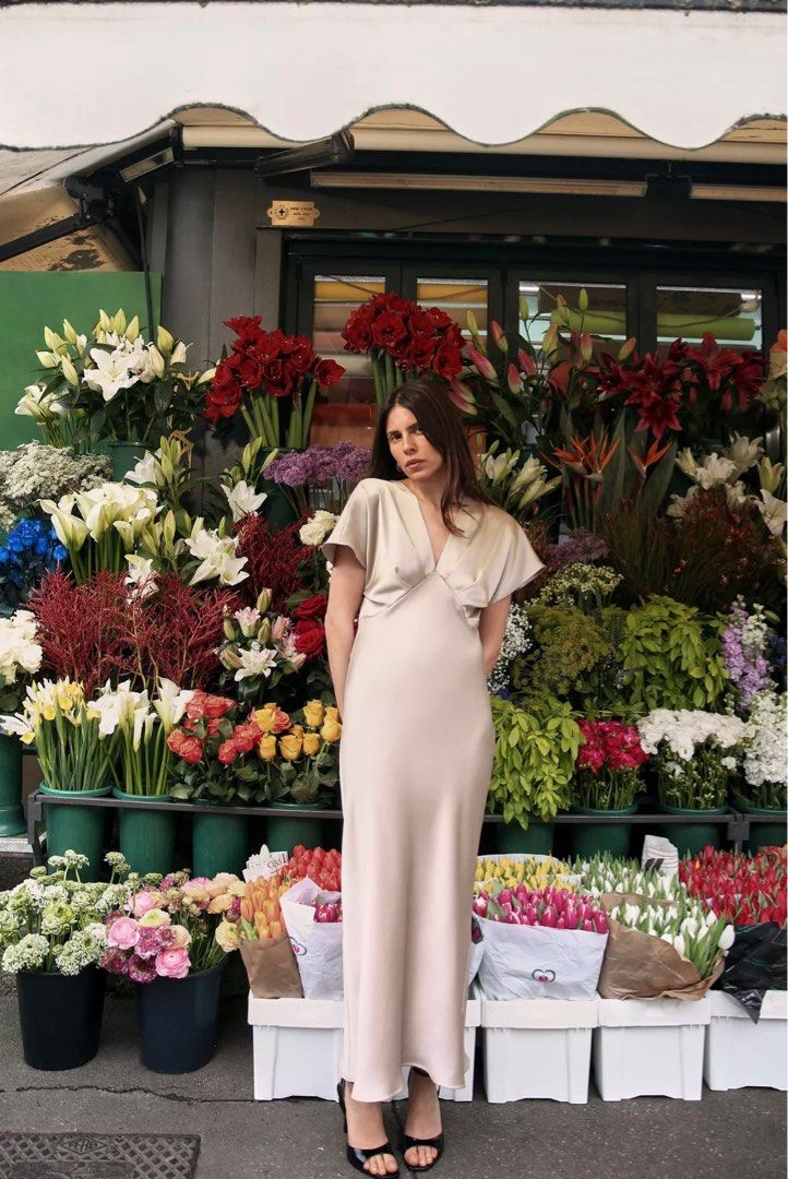 Zara Satin Midi Dress (Category: Dresses) located in Makati City. Submitted by meridaaa (Listing ID 1374097545, Image 3). Description: Original price: ₱2,595 Worn once. Perfect condition. Has a side zipper. Beige color. Message me for when worn..