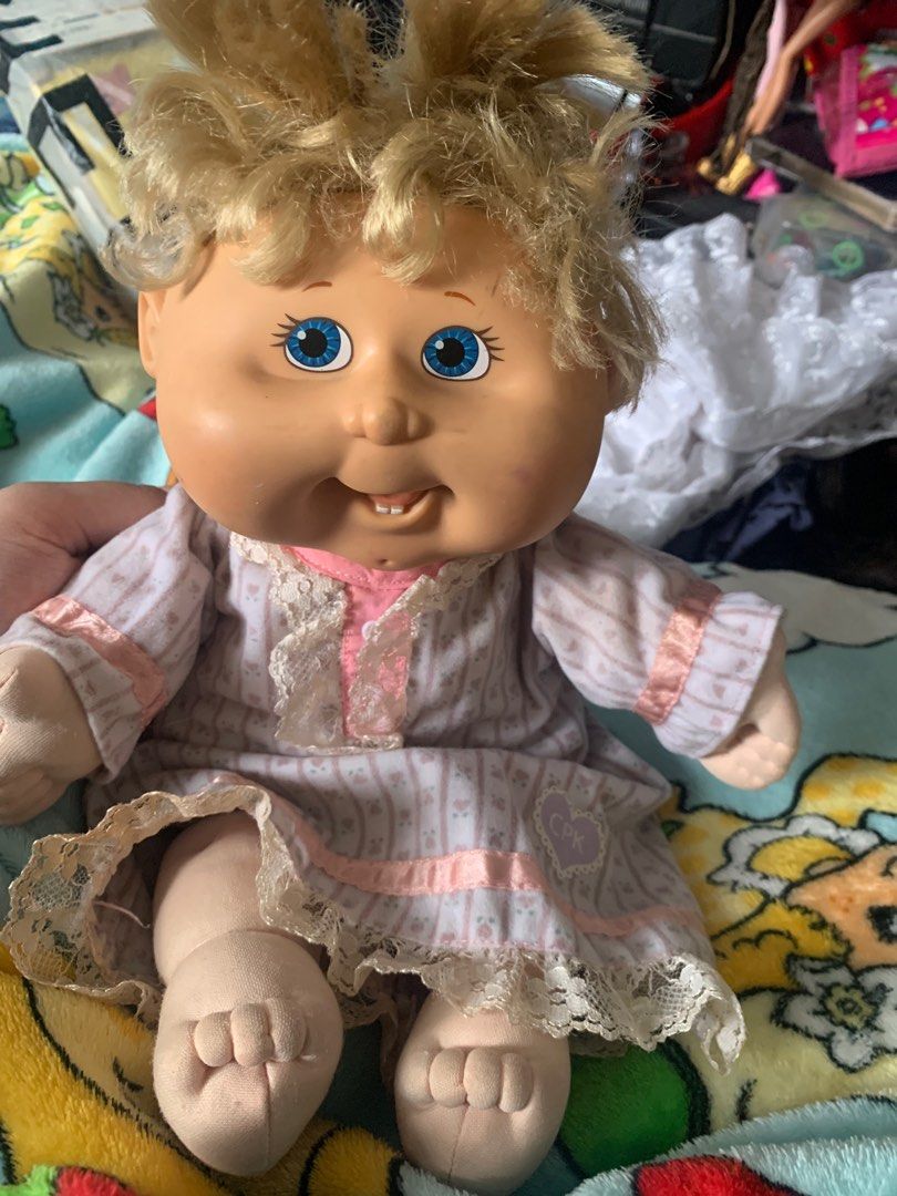 2004 Play Along Cabbage Patch Doll (Category: Plushies & Soft Toys) located in Las Pinas. Submitted by aokisells (Listing ID 1374220339, Image 1). Description: still has the smell, pens marks on face and back of the head but they’re washable.