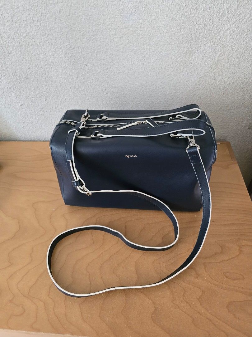 Agnes B Blue Leather Boston Bag (Category: Bags & Wallets) located in Singapore. Submitted by packard1973 (Listing ID 1374182538, Image 1). Description: No low balling No Trade in Price exclude postage & courier cost,buyer have to pay No stain ,no leather peeling Dustbag included Shoulder carry & adjustable strap for crossbody carry leather material Dimensions: length 30cm,height 16cm,depth 12cm Meetup for collection at Delta Avenue (in between T