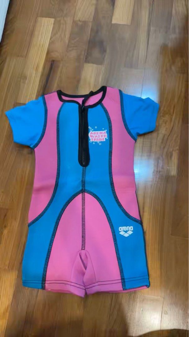 Arena Baby Swimsuit 1-2 Years (Category: Babies & Kids Fashion) located in Singapore. Submitted by summercranberries (Listing ID 1374210402, Image 1). Description: FREE DELIVERY This is an Arena baby swimsuit, perfect for your little one! It's designed for babies aged 1 to 2 years old. The swimsuit features a vibrant color scheme of blue and pink, with a convenient zipper closure. It's a great choice for swimming lessons or fun in the water. The 