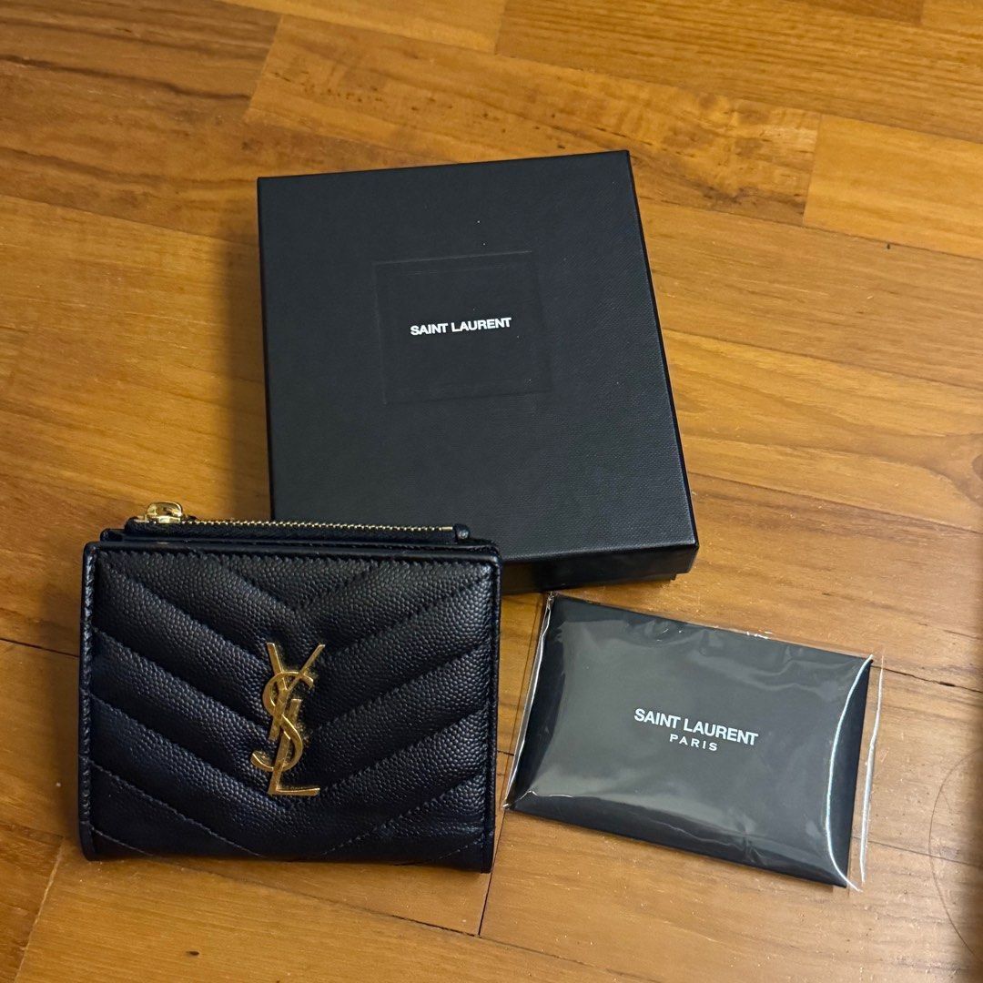 Authentic Yves Saint Laurent YSL Bi-Fold Wallet (Category: Luxury Bags & Wallets) located in Quezon City. Submitted by breakmyfashion (Listing ID 1374191262, Image 1). Description: Comes with box and authenticity card. .