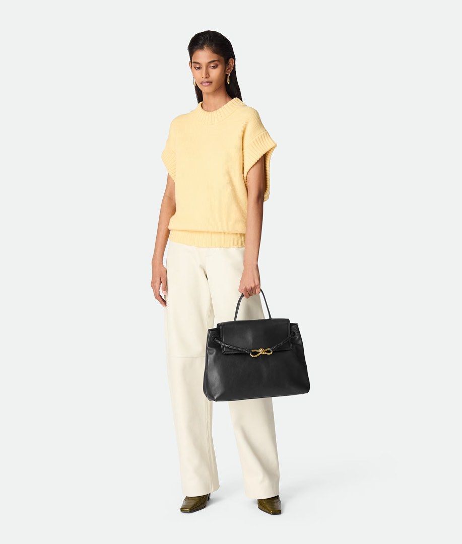 Bottega Veneta Ciao Ciao (Category: Bags & Wallets) located in Singapore. Submitted by danjhl (Listing ID 1374237966, Image 2). Description: BRAND NEW, comes with dustbag, paper bag, original receipt. NO BOX Retail selling at S$7980, letting go at S$7,000. Just bought last week PRODUCT DETAILS Close the dialog Top handle bag in silky calf leather with two-way flap and signature knot detail. Features a hidden hook closure, allowing the flap to be 