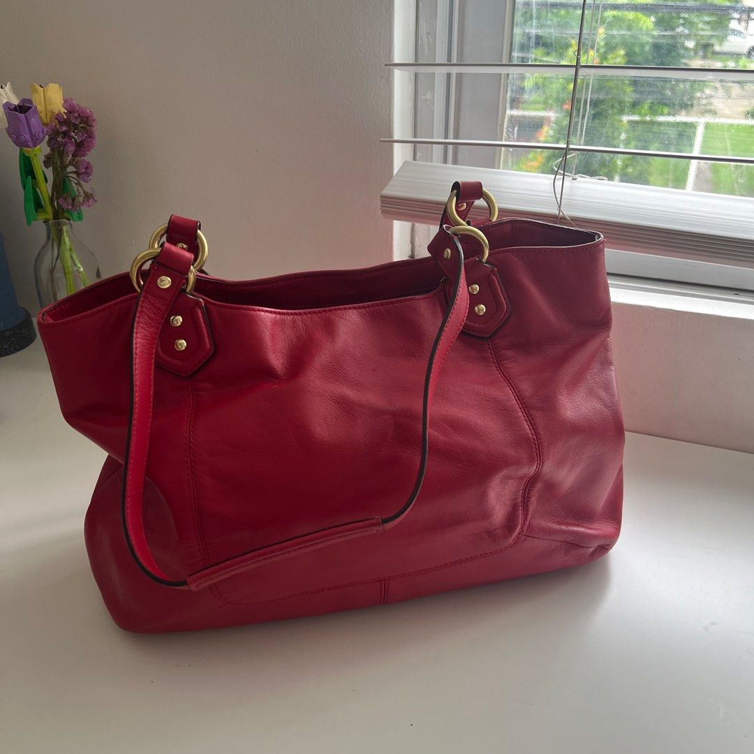 Coach Tote Campbell Leather in red (Category: Luxury Bags & Wallets) located in Pasig City. Submitted by emporium_mnl (Listing ID 1374229564, Image 3). Description: Ranking: 9 out of 10 Brand: Coach Flaw: Light scratch Can Fit a lot (Ipad Air for reference) *Can send measurements thru pm 100% Original From Coach store USA Slightly negotiable Shipping Fee shouldered by buyer No returns & No exchange once paid. .