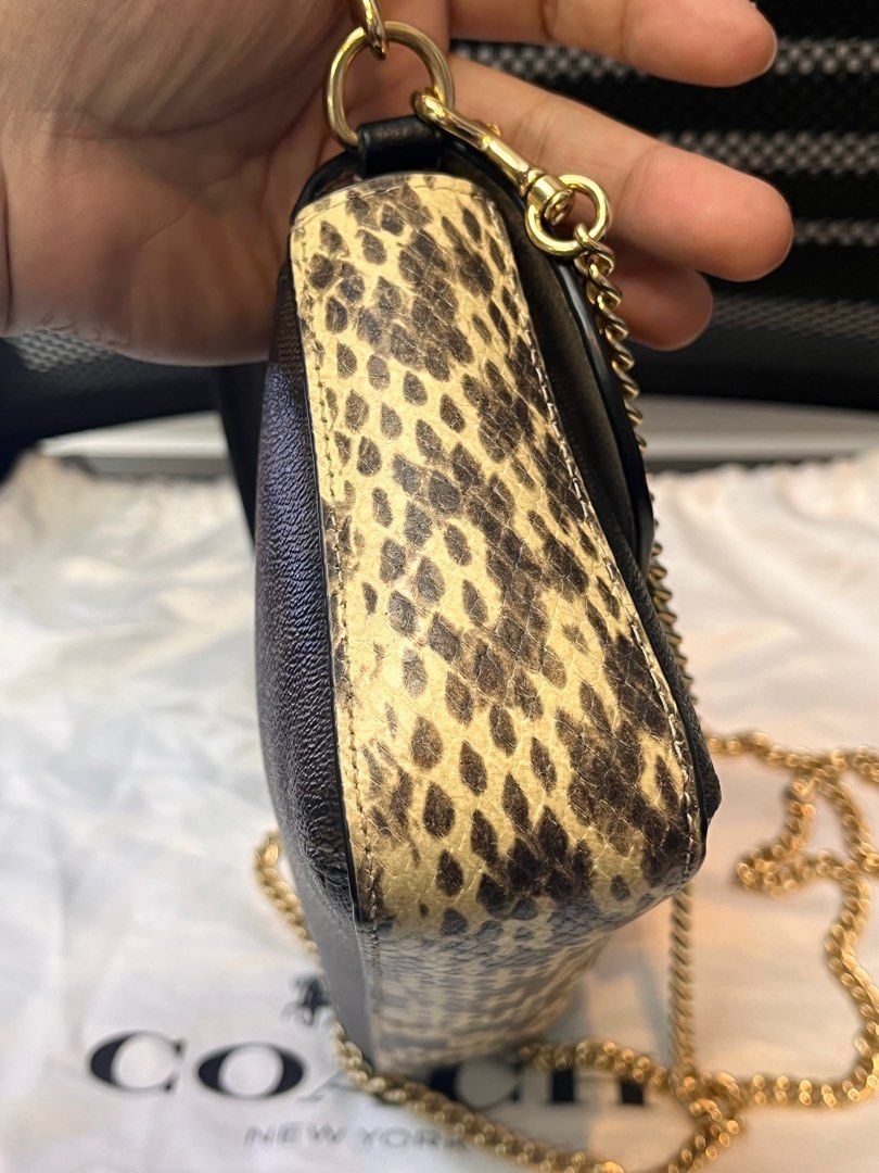 COACH Tricolor Mini Grace Two Way Bag (Category: Luxury Bags & Wallets) located in Taguig. Submitted by mhalet.902 (Listing ID 1374201349, Image 3). Description: Gender: Ladies’ Material: Signature coated canvas, refined pebble leather, smooth leather and snake-embossed leather Stamp: F2232 CC033 Interior: One compartment with Three open pockets Measurements: 8.9”L X 2”W X 5”H Handle Drop: 5” Hardware: Gold tone Inclusions: Original dust bag, Rem