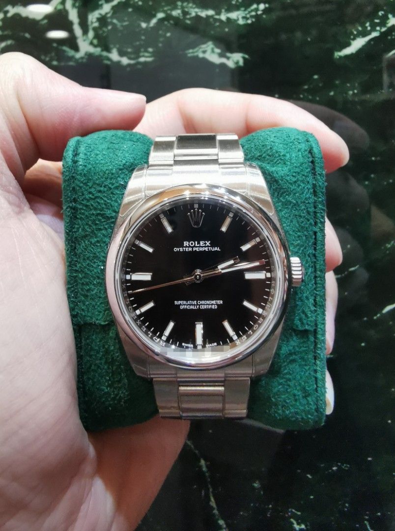 Feb 2020 Rolex Oyster card Op34 black dial 114200 (Category: Watches) located in Singapore. Submitted by hengwatch (Listing ID 1374281752, Image 1). Description: Rolex Oyster perpetual OP 34 black dial Model number 114200 Mint condition With protection film applied Comes with box and cert dated Feb 2020 Selling for $6600 Subscribe to our tele-gram group for constant updates //t.me/HengWatch Hsbc and standard chartered and dbs and uob ipp availabl