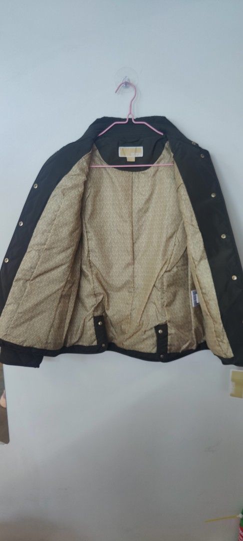 Jacket (Category: Coats, Jackets and Outerwear) located in Singapore. Submitted by bessdeal (Listing ID 1374179627, Image 3). Description: Beautiful Michael Kors checker puffer jacket, color dark moss (green), classic look front, back and inside.
