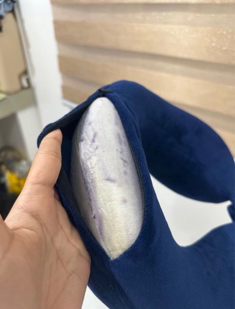 Navy Blue Neck Pillow (Category: Travel Essentials & Accessories) located in Quezon City. Submitted by jinny116 (Listing ID 1374236831, Image 3). Description: Very handy when traveling! and washable! Comes with a hard case Please see attached photos for the condition of the item. RFS: Barely used; Decluttering.