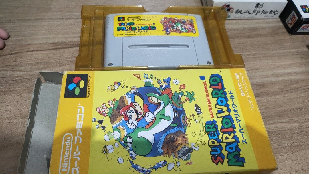 Nintendo Super Famicon Bundle (Category: Nintendo) located in Manila. Submitted by nges_hu (Listing ID 1374178500, Image 3). Description: set includes: Super Famicom Console (complete set w/ manual) Street Fighter II Street Fighter II Super Street Fighter II Turbo Super Mario World Romancing Saga 2 Romancing Saga 3 Final Fantasy V Dragon Quest V Silva Saga II NBA Live 96 Shin Momotarou Densetsu SD Kidou Senshi Gundam 2 3000 + sf.