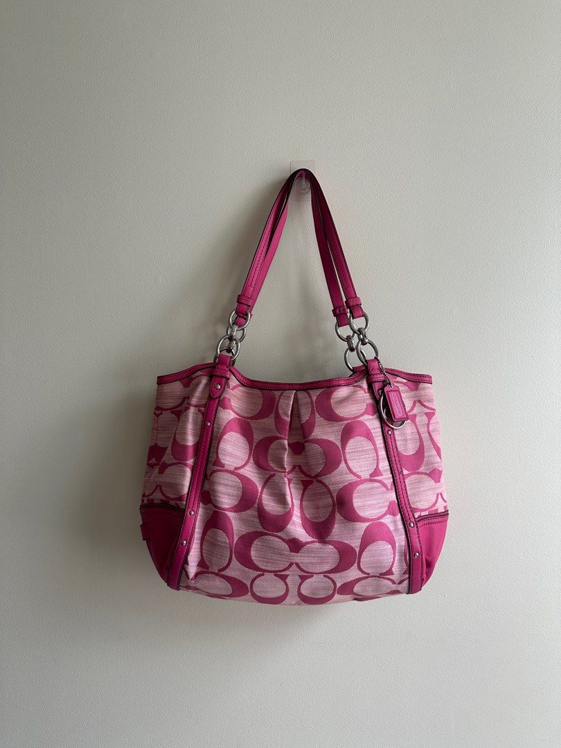 Pink Coach Tote Bag (Category: Tote Bags) located in Makati City. Submitted by ribsclutter (Listing ID 1374239237, Image 1). Description: Authentic Coach Tote Bag Rare in Pink 🌸 Coach Alexandra Shoulder Bag CC Signature Canvas Leather F21919 Sourced from Japan 🇯🇵 No issues / Good as new 📍Makati City MOP: Gcash upon handing over to rider MOD: J&T / Lalamove / Same day delivery .